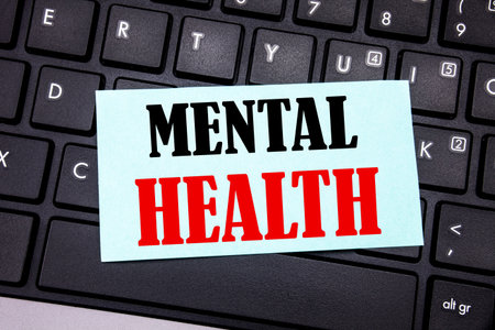 Word, writing Mental Health. Business concept for Anxiety Illness Disorder written on sticky note paper on black keyboard background.の写真素材