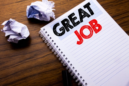 Writing text showing Great Job. Business concept for Success Appreciation written on notebook notepad note paper on wooden background with folded paper meaning thinking for ideaの写真素材