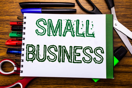 Conceptual hand writing textSmall Business.  Concept for Family Owned Company Written on notebook,...