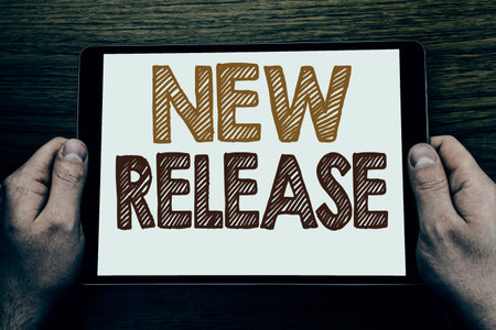 Hand writing text caption New Release . Business concept for Technology Software Update Written...