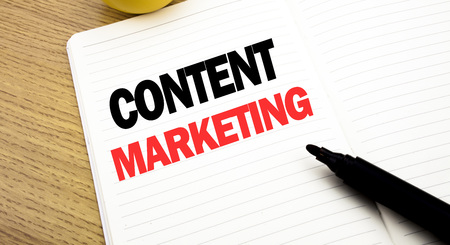 Conceptual hand writing text caption inspiration showing Content Marketing. Business concept for Online Media Plan written on notebook with space on book background with marker penの写真素材