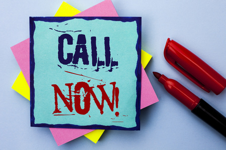Writing note showing  Call Now. Business photo showcasing Contact Talk Chat Hotline Support Telephony Customer Service written Sticky Note Paper the Plain background Marker next to it.の写真素材