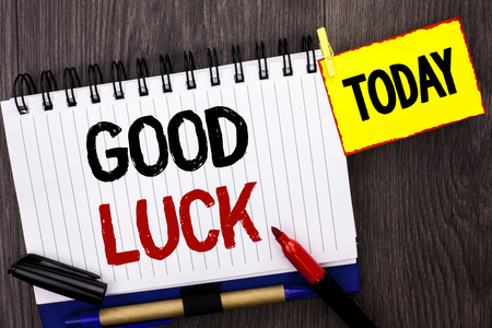 Word writing text Good Luck. Business concept for Lucky Greeting Wish Fortune Chance Success Feelings Blissful written Notebook Book the wooden background Today Marker next to it.の写真素材