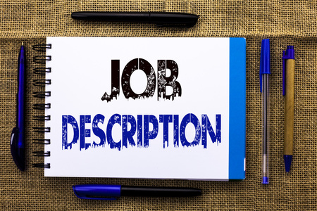 Conceptual hand writing showing Job Description. Business photo text Document that establishes duties requirements exprerience written Notebook Book the jute background Pens next to it.の写真素材