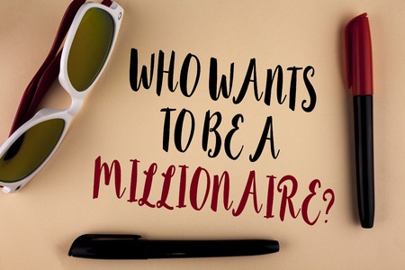 Word writing text who Wants To Be A Millionaire Question. Business concept for Earn more money applying knowledge written plain background Markers and Sun Glasses next to it.の写真素材