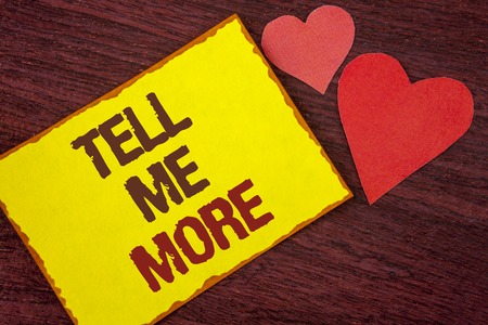 Conceptual hand writing showing Tell Me More. Business photo text Elaborate your business thoughts further for assistance written Yellow Sticky note paper wooden background Hearts. の写真素材