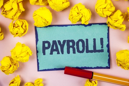 Writing note showing  Payroll Motivational Call. Business photo showcasing Total salaries paid by a company to its employees written Sticky note paper within paper balls plain background Penの写真素材