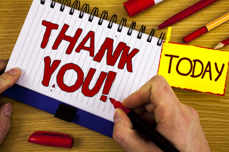 Handwriting text Thank You Motivational Call. Concept meaning Appreciation greeting Acknowledgment Gratitude written by Marker in Hand Notebook wooden background Today Pen Pencil next to itの写真素材