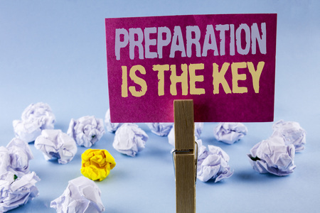 Conceptual hand writing showing Preparation Is The Key. Business photo text Learn Study Prepare yourself for achieving success written Sticky Note Paper plain background Paper Balls Clipの写真素材