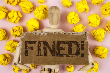 Conceptual hand writing showing Fined Motivational Call. Business photo showcasing No penalty charge for late credit card bill payment written Tear Cardboard piece pink background wooden Toyの写真素材