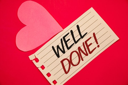 Text sign showing Well Done Motivational Call. Conceptual photo Good Job Great Results Positive EvaluationNotebook page red background Pink Heart Black letters Love note romanticの写真素材