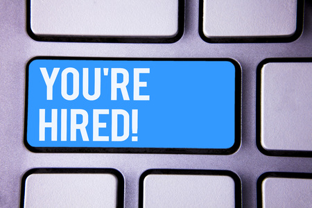 Wordss writing textss You Are Hired Motivational Call. Business concept for New employee recruited Worker selectedの写真素材