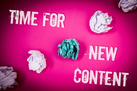Handwriting text Time For New Content. Concept meaning Copyright Publication Update Concept Publishing Light pink floor circled shadow ruffled white paper balls middle green ballの写真素材