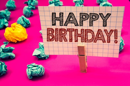 Writing note showing  Happy Birthday Motivational Call. Business photo showcasing Congratulations Celebrating Anniversary Clothespin hold holding white paper black red letters crumpled papersの写真素材