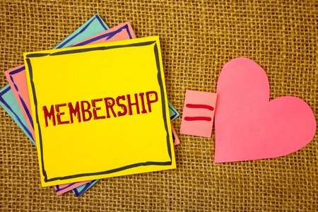 Conceptual hand writing showing Membership. Business photo texts Being member Part of a group or team Join an organizationIdeas created on note papers equal sign heart wicker backgroundの写真素材