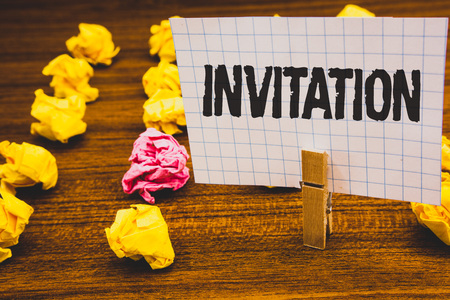 Conceptual hand writing showing Invitation. Business photo text Written or verbal request someone to go somewhere or do something Clothespin hold holding notebook paper crumpled papers ideasの写真素材