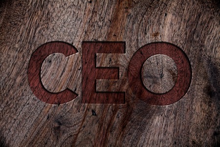 Writing note showing  Ceo. Business photo showcasing Chief Executive Officer Head Boss Chairperson Chairman Controller Wooden background vintage wood board wild rough old antique messagesの写真素材