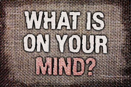 Writing note showing  What Is On Your Mind Question. Business photo showcasing Open minded thinks of intellectual innovation Antique jute background message vintage reflections thoughts feelingsの写真素材