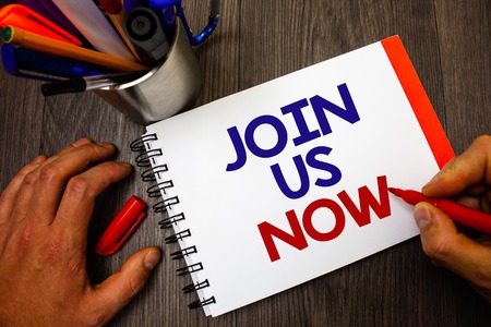 Text sign showing Join Us Now. Conceptual photo Enroll in community Register in website or form Recruit Penholder notepad marker feelings ideas appointments information importantの写真素材