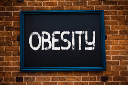 Conceptual hand writing showing Obesity. Business photo showcasing Medical condition Excess of body...