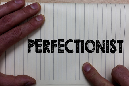 Writing note showing Perfectionist. Business photo showcasing Person who wants everything to be perfect Highest standards Notebook register line drawing office routine hand fingers busy workの写真素材