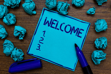 Handwriting text Welcome. Concept meaning Warm salutation acknowledgement for someone amiable loved thanked Cyan paper imagination idea thoughts mistakes several tries marker penの写真素材