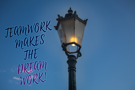 Handwriting text writing Teamwork Makes The Dream Work Call. Concept meaning Camaraderie helps achieve success Light post blue sky enlighten ideas message reflection thoughts intentionsの写真素材