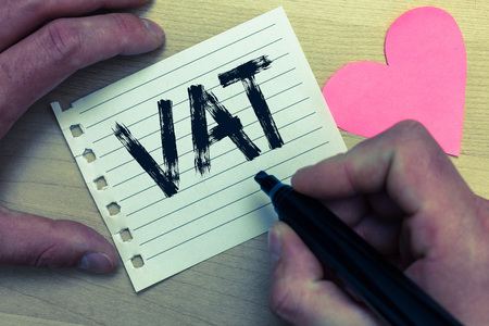 Text sign showing Vat. Conceptual photo Consumption tax levied on sale barter for properties and services Wood nice love colour hart marker pen art work memories black shadowの写真素材
