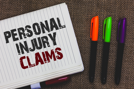 Text sign showing Personal Injury Claims. Conceptual photo being hurt or injured inside work environment Open notebook page jute background colorful markers Expressing ideas Text sign showing Personal Injury Claims. Conceptual photo being hurt or injured inside work environment Open notebook page jute background colorful markers Expressing ideas