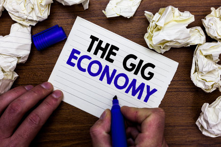 Writing note showing The Gig Economy. Business photo showcasing Market of Short-term contracts...