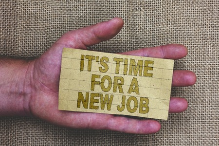 Conceptual hand writing showing It s is Time For A New Job. Business photo showcasing Career changes seeking other work Recruitment Thick gray paper with words human hands jute sack backgroundの写真素材