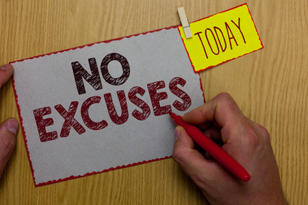 Word writing text No Excuses. Business concept for telling someone not to tell reasons for certain problem Man holding marker paper clothespin reminder express ideas wooden tableの写真素材