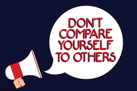 Writing note showing Don t not Compare Yourself To Others. Business photo showcasing Be your own version unique original Man holding megaphone loudspeaker speech bubble black backgroundの写真素材