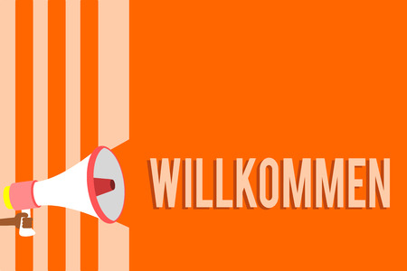 Writing note showing Willkommen. Business photo showcasing welcoming people event or your home something to that effect Megaphone loudspeaker orange stripes important message speaking loudの写真素材