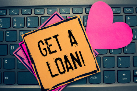 Writing note showing Get A Loan. Business photo showcasing mount of money that is borrowed often...