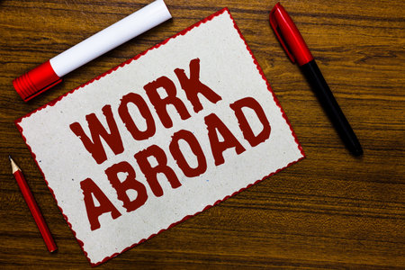 Handwriting text writing Work Abroad. Concept meaning Immersed in a foreign work environment Job...