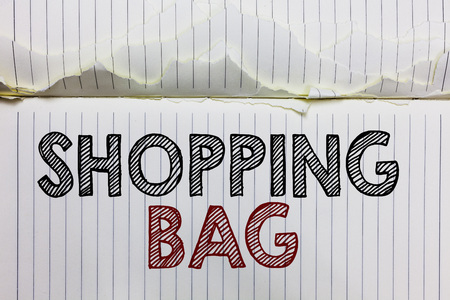 Handwriting text Shopping Bag. Concept meaning Containers for carrying personal possessions or purchases Open notebook page crumpled papers ripped pages several tries mistakesの写真素材