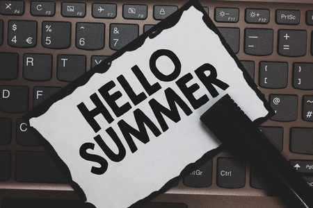 Handwriting text Hello Summer. Concept meaning Welcoming the warmest season of the year comes after spring White paper keyboard Inspiration communicate ideas messages Black markersの写真素材