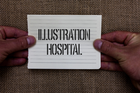 Text sign showing Illustration Hospital. Conceptual photo unique Applied Art of Medical Institution and Practice Man holding piece notebook paper jute background Communicating ideasの写真素材