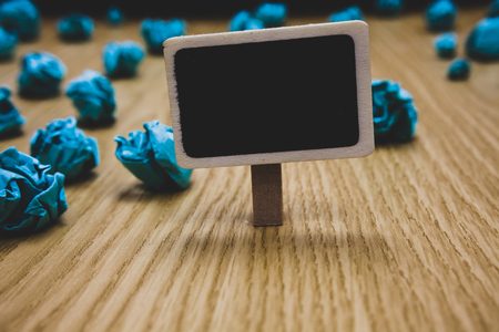 Design business concept Empty copy text for Web banners promotional material mock up template. Blackboard crumpled papers several tries mistake not satisfied wooden floorの写真素材