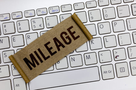 Handwriting text writing Mileage. Concept meaning Number of miles travelled or covered Display panel...