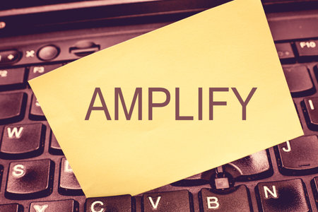 Handwriting text writing Amplify. Concept meaning Make something bigger louder increase the volume...