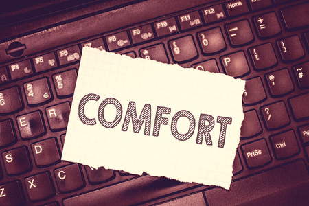 Conceptual hand writing showing Comfort. Business photo text Physical ease Freedom from pain Relaxation Resting comfortably.の写真素材