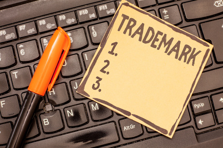 Conceptual hand writing showing Trademark. Business photo showcasing Legally registered Copyright Intellectual Property Protection.の写真素材