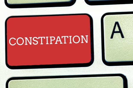 Text sign showing Constipation. Conceptual photo Bowel movements that are erratic Trouble in clearing the bowels.の写真素材