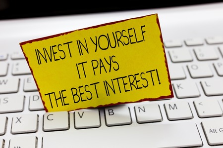 Handwriting text writing Invest In Yourself It Pays The Best Interest. Concept meaning Nurture oneself Plan the future.の写真素材