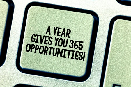 Conceptual hand writing showing A Year Gives Your 365 Opportunities. Business photo showcasing Fresh new start Motivation inspiration Keyboard key Intention create computer message keypad ideaの写真素材