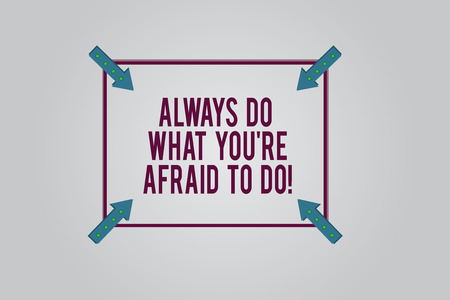 Writing note showing Always Do What You Re Afraid To Do. Business photo showcasing Overcome your fear Challenge motivation Square Outline with Corner Arrows Pointing Inwards on Color Backgroundの写真素材