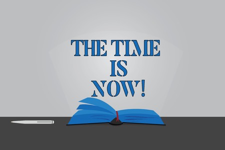 Text sign showing The Time Is Now. Conceptual photo Encouraging someone to start doing today not tomorrow Color Pages of Open Book photo on Table with Pen and Light Beam Glaringの写真素材