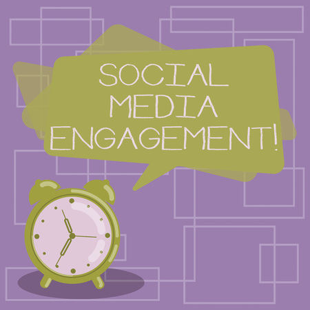 Text sign showing Social Media Engagement. Conceptual photo Communicating in an online community platforms Blank Rectangular Color Speech Bubble Overlay and Analog Alarm Clockの写真素材